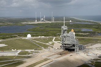 STS-129 on launch pad with Ares in the background