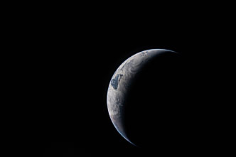 Earth seen from Artemis II after translunar injection burn