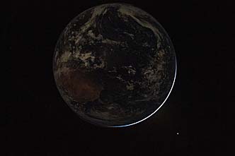 Earth seen from Artemis II after translunar injection burn